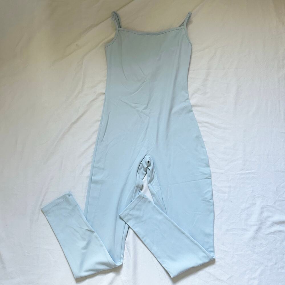 light blue sleeveless activewear bodysuit